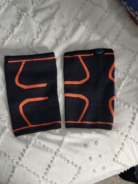 Compression Knee Sleeves in Black and Orange — Unbranded